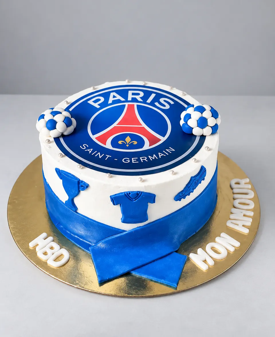 White and blue Paris Saint-Germain cake with a fondant scarf, shirt and trophy